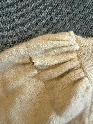 Sleeve panel material quality & stitching faulty causing damage