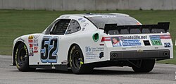 Joey Gase's white racing car with Wilson's image on the back and an organ donation appeal from DonateLife.net