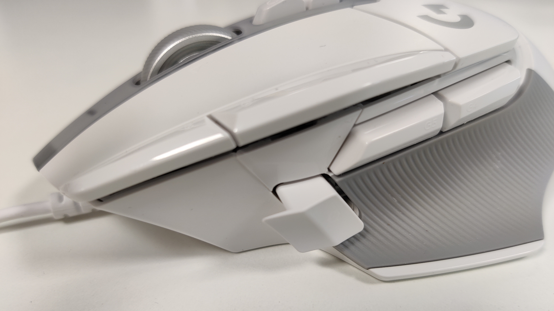 A side view of the Logitech G502 X gaming mouse.