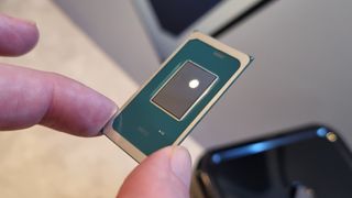 An Intel Core Ultra Series 3 chip held between two fingers