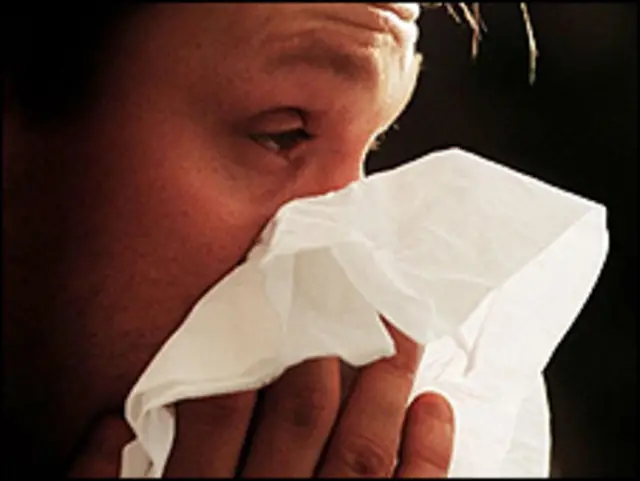 Hombre con gripe