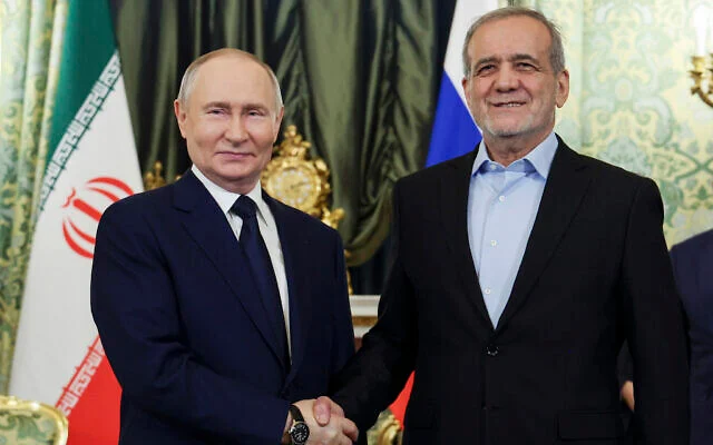 Russian President Vladimir Putin, left, and Iranian President Masoud Pezeshkian pose for a photo during their meeting at the Kremlin in Moscow, Russia, January 17, 2025. (Vyacheslav Prokofyev, Sputnik, Kremlin Pool Photo via AP) Russian President Vladimir Putin, left, and Iranian President Masoud Pezeshkian pose for a photo during their meeting at the Kremlin in Moscow, Russia, January 17, 2025. (Vyacheslav Prokofyev, Sputnik, Kremlin Pool Photo via AP)